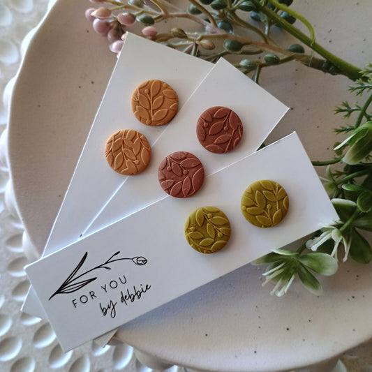Circle studs - earthy tones leaf imprint