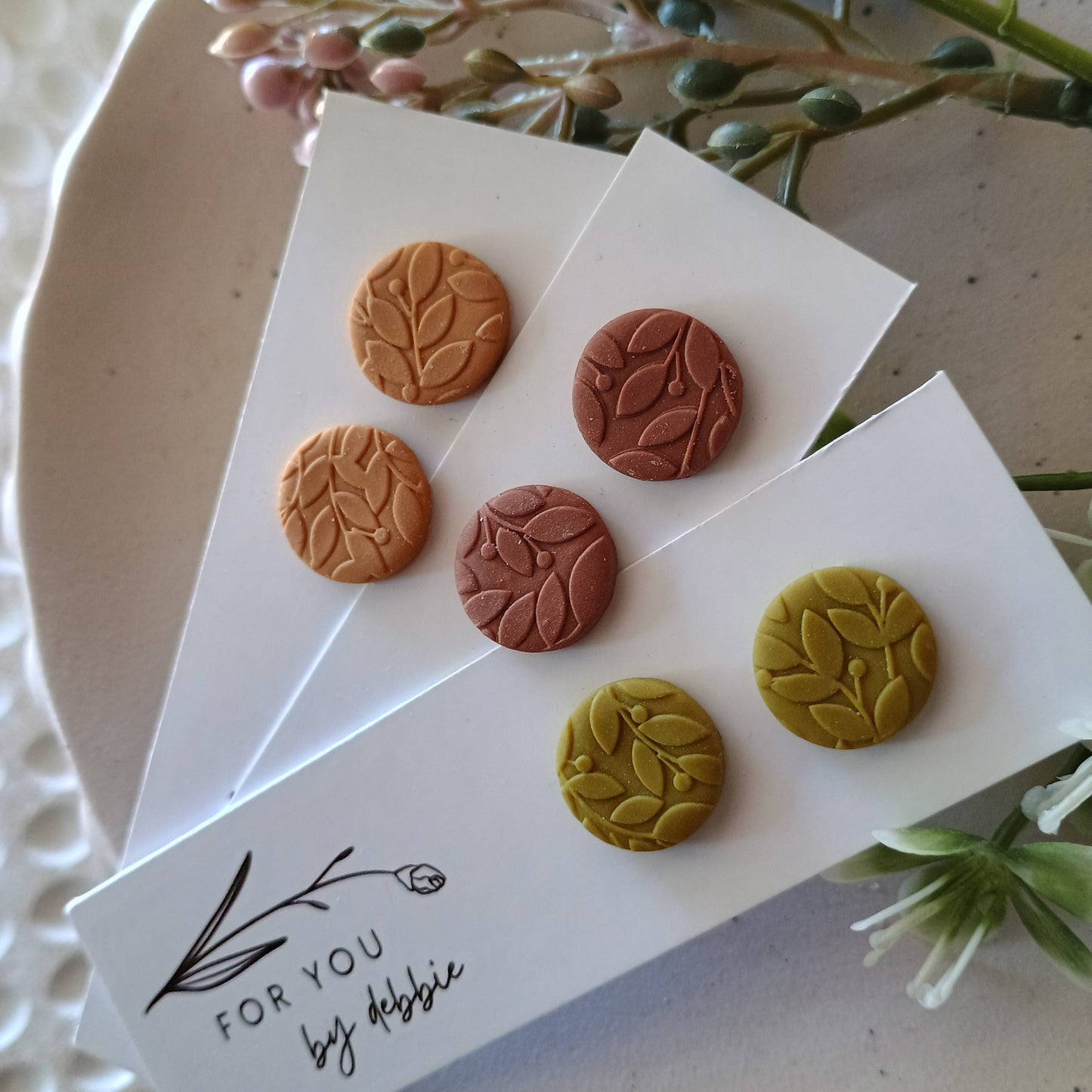Circle studs - earthy tones leaf imprint