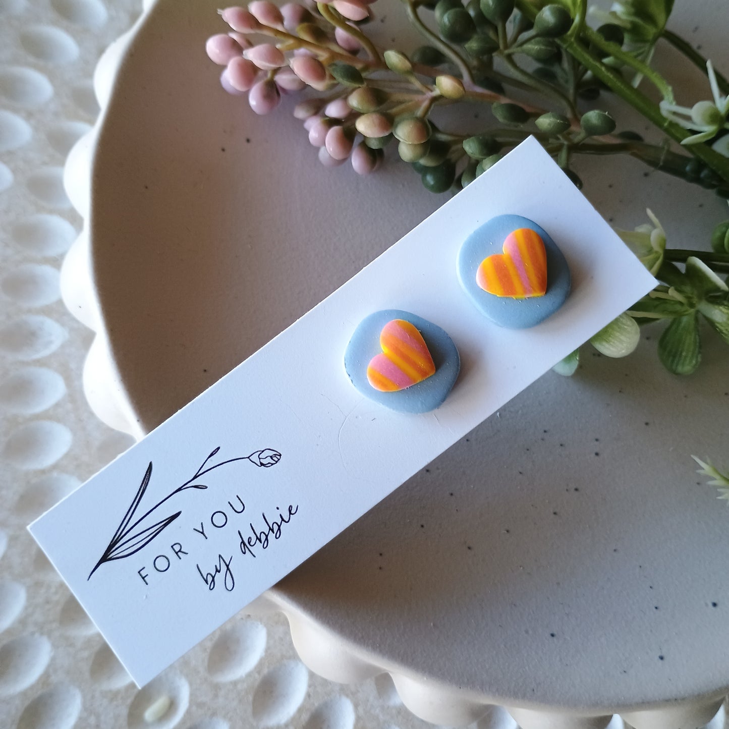 Squoval studs - blue and yellow heart