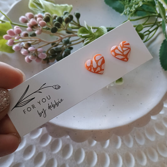 Heart studs - painted orange resin