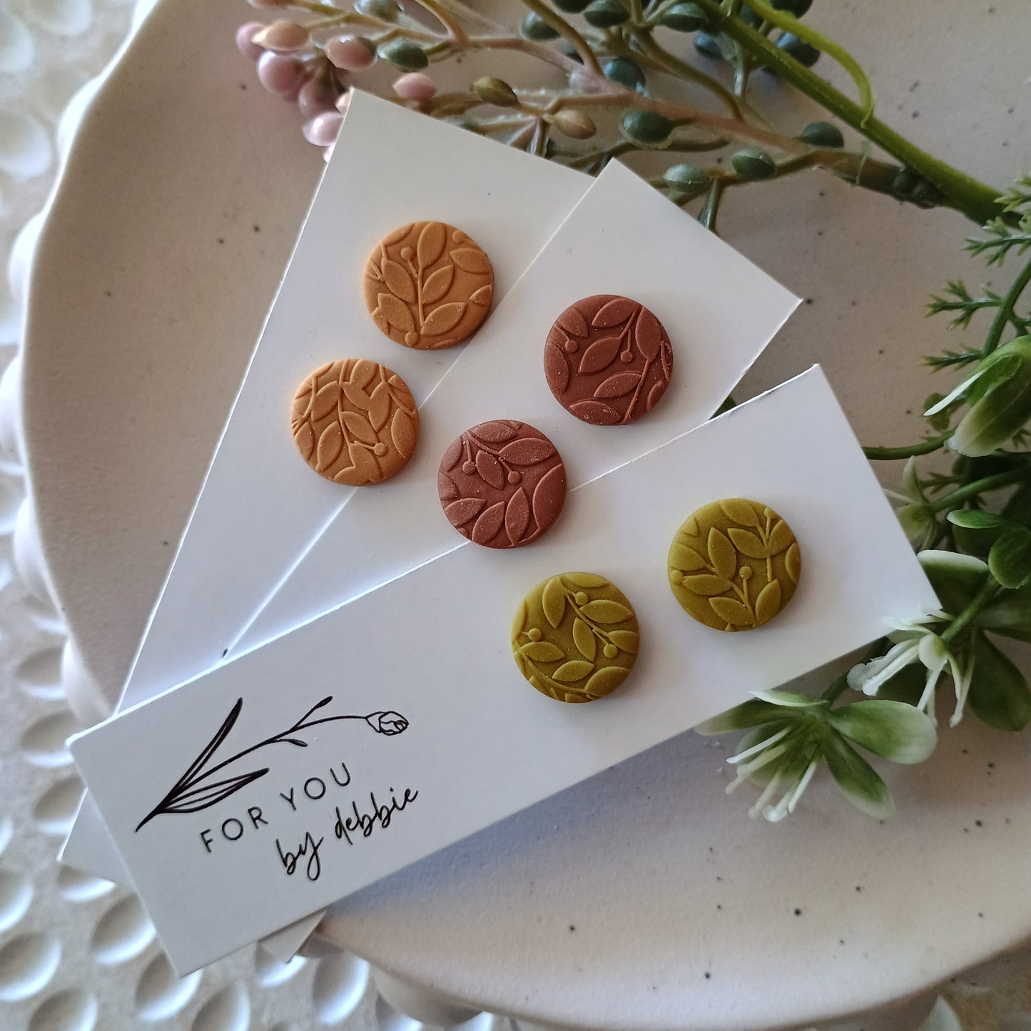 Circle studs - earthy tones leaf imprint