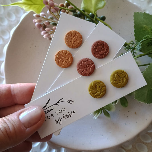 Circle studs - earthy tones leaf imprint