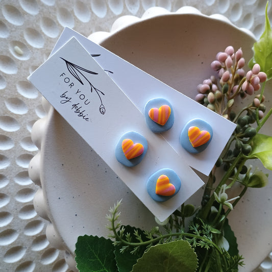 Squoval studs - blue and yellow heart