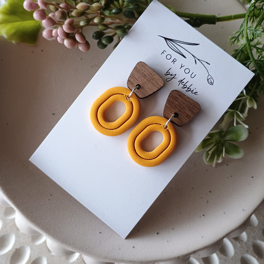 Ronnie dangles- mustard and wood