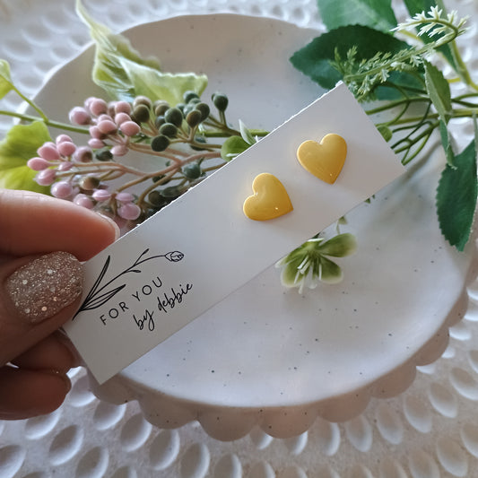 Heart studs - yellow resin